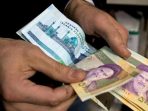 Bagaimana Mata Uang Iran